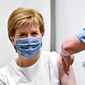 Nicola Sturgeon should consider emergency regulation to require health and social care staff to be vaccinated against Covid (Picture: Jeff J Mitchell/Getty Images)