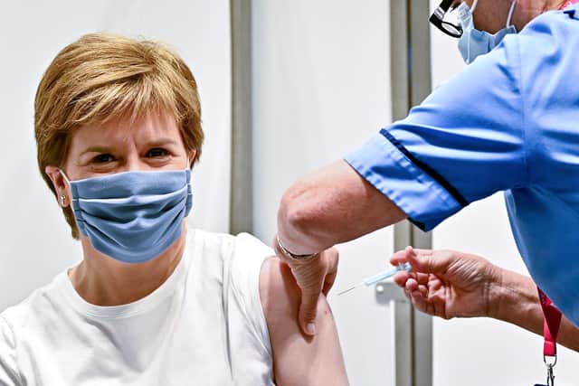 Nicola Sturgeon should consider emergency regulation to require health and social care staff to be vaccinated against Covid (Picture: Jeff J Mitchell/Getty Images)