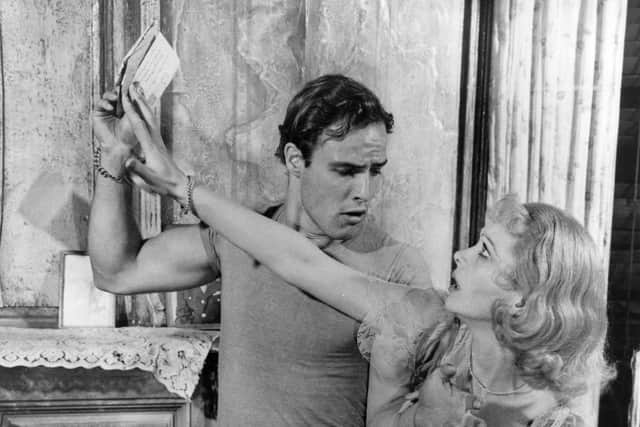 Marlon Brando and Vivien Leigh in a scene from the film A Streetcar Named Desire, adapted from the play by Tennessee Williams (Picture: Hulton Archive/Getty Images)