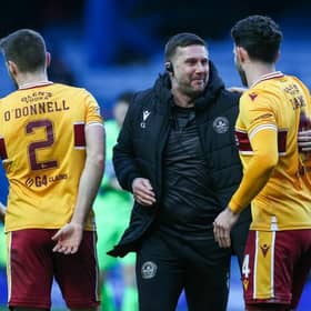 Motherwell assistant manager Chris Lucketti celebrates with Ricki Lamie at full-time following the 2-2 draw against Rangers at Ibrox. (Photo by Craig Williamson / SNS Group)