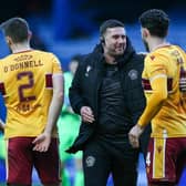 Motherwell assistant manager Chris Lucketti celebrates with Ricki Lamie at full-time following the 2-2 draw against Rangers at Ibrox. (Photo by Craig Williamson / SNS Group)