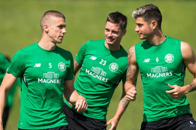 Jozo Simunovic (left) with former Celtic team-mates Mikael Lustig and Nir Bitton during a training session at Lennoxtown