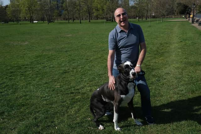 Paul Mckenna walks his dog in Kensington Gardens, London 2020. Pic: Richard Young/Shutterstock