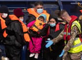 Migrants arrive at Dover port after being picked up in the channel by the  border force yesterday in Dover, England.