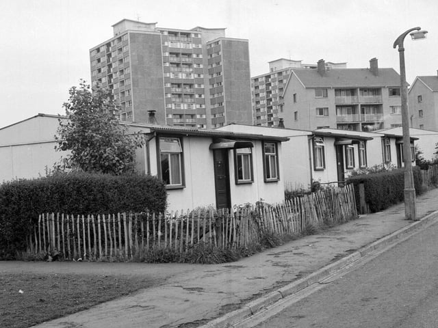The newly-constructed Comiston multi-storey flats at Oxgangs. Prefabs shown in foreground.
