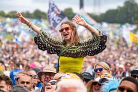 Crowds watch Olivia Dean perform on the pyramid stage at Glastonbury Festival at Worthy Farm in Somerset.