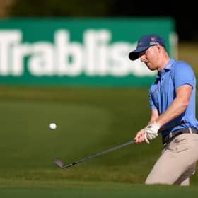 Craig Howie plays out of the 13th greenside bunker in the second round of the Rolex Challenge Tour Grand Final supported by The R&A at Club de Golf Alcanada in Mallorca. Picture: Angel Martinez/Getty Images.