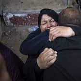 Palestinians in the hospital in Khan Younis mourn relatives killed in the Israeli bombardment of the Gaza Strip. Picture: Fatima Shbair/AP