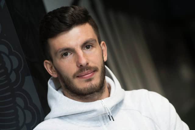 Romanian defender Mihai Popescu is Hearts' latest signing.