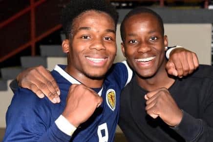 Dire (pictured right) with brother Dapo has also had Scotland recognition (Photo by Ross MacDonald / SNS Group / SFA)