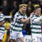 Liam Scales with Celtic captain Callum McGregor, who has announced his retirement from international football. (Photo by Paul Devlin / SNS Group)