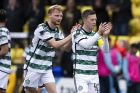 Liam Scales with Celtic captain Callum McGregor, who has announced his retirement from international football. (Photo by Paul Devlin / SNS Group)