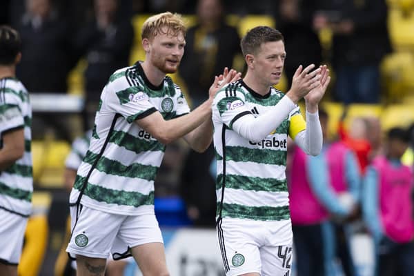 Liam Scales with Celtic captain Callum McGregor, who has announced his retirement from international football. (Photo by Paul Devlin / SNS Group)