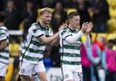 Liam Scales with Celtic captain Callum McGregor, who has announced his retirement from international football. (Photo by Paul Devlin / SNS Group)