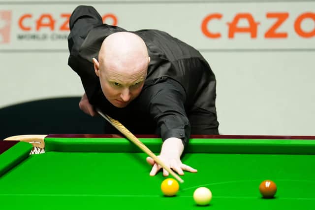 Anthony McGill during his match with Judd Trump (not pictured) on day four of the Cazoo World Snooker Championship at the Crucible Theatre, Sheffield.