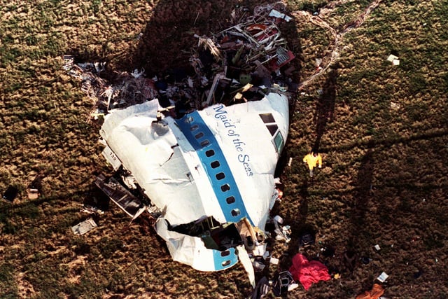 The nose section of Pan Am Flight 103, a 747 airliner lies in a field outside the village of Lockerbie, Scotland, in this Dec. 22, 1988 file photo.