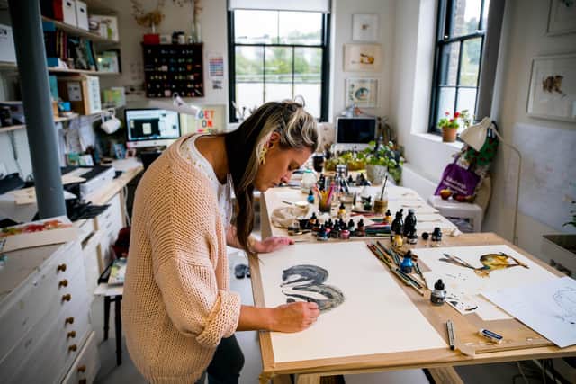 Catherine Rayner working in her studio