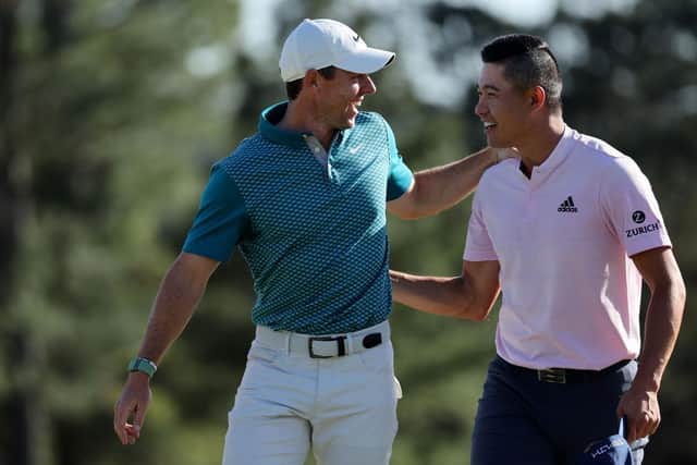 AUGUSTA, GEORGIA - APRIL 10: Rory McIlroy of Northern Ireland (L) and Collin Morikawa celebrate on the 18th green after finishing their round during the final round of the Masters at Augusta National Golf Club on April 10, 2022 in Augusta, Georgia. (Photo by Gregory Shamus/Getty Images)