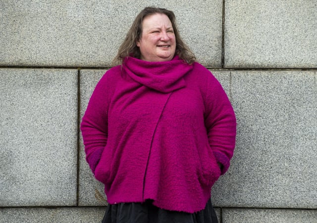 Mary Gordon chalked the words "women's rights are not a hate crime" on a wall in front of St Andrew's House.