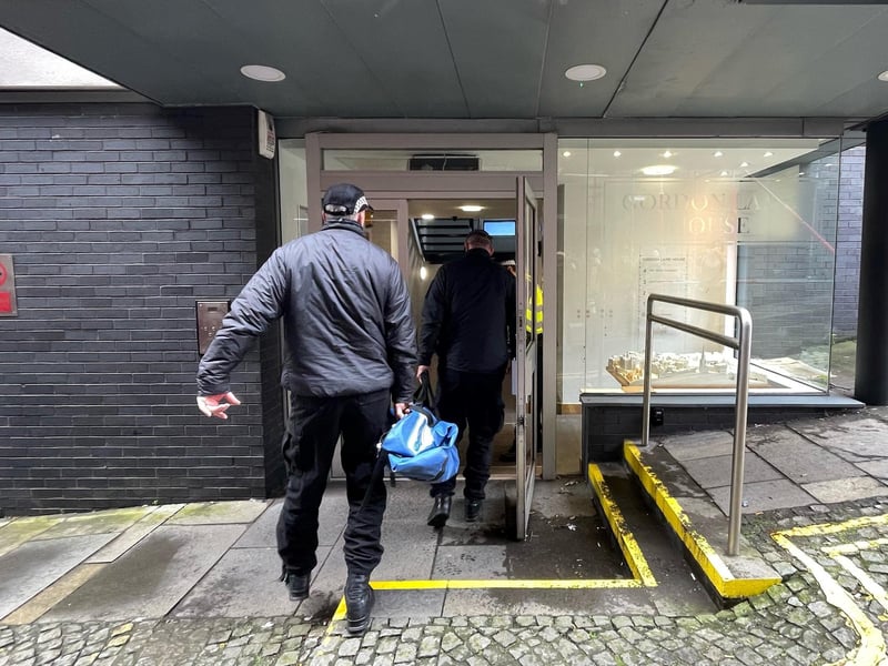 Officers from Police Scotland entering the headquarters of the SNP in Edinburgh following the arrest of former chief executive Peter Murrell.