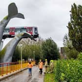 A Dutch metro train was saved from disaster on Sunday night after it smashed through a safety barrier but was prevented from plummeting into water by a sculpture of a whale tail. (Photo by Robin Utrecht / ANP / AFP)