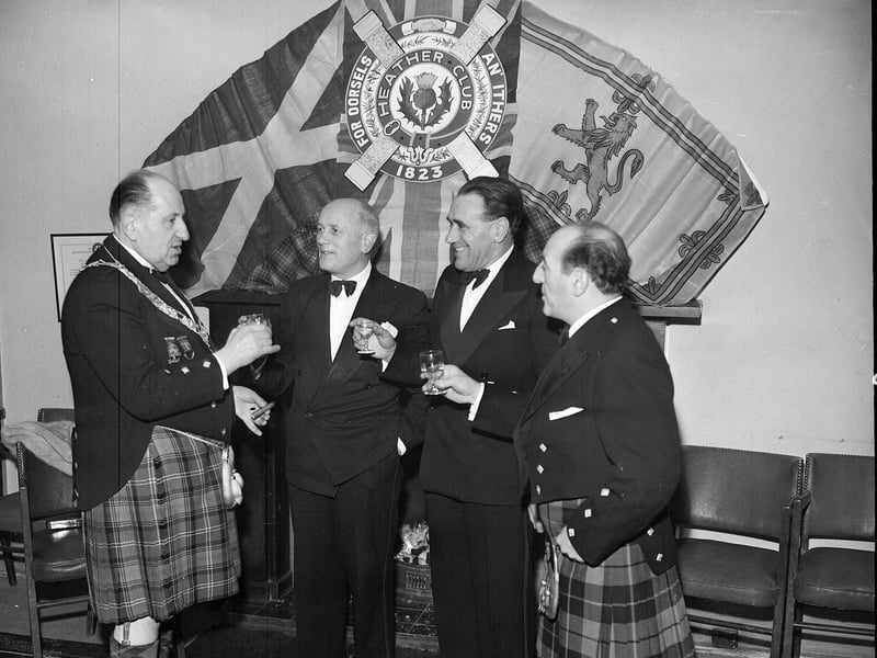 Mr Deane, Mr James Hoy, Mr E Willis and Mr M Valente at the Heather Club Burns Supper in 1963.
