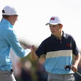 Calum Scott, left, and Connor Graham react during the Saturday Foursomes on day one of the 49th Walker Cup at St Andrews. Picture: Oisin Keniry/R&A/R&A via Getty Images.