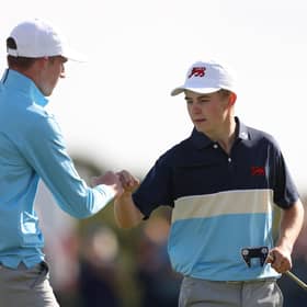 Calum Scott, left, and Connor Graham react during the Saturday Foursomes on day one of the 49th Walker Cup at St Andrews. Picture: Oisin Keniry/R&A/R&A via Getty Images.