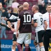 Robbie Neilson and Scott Brown argue at full-time at Tynecastle.