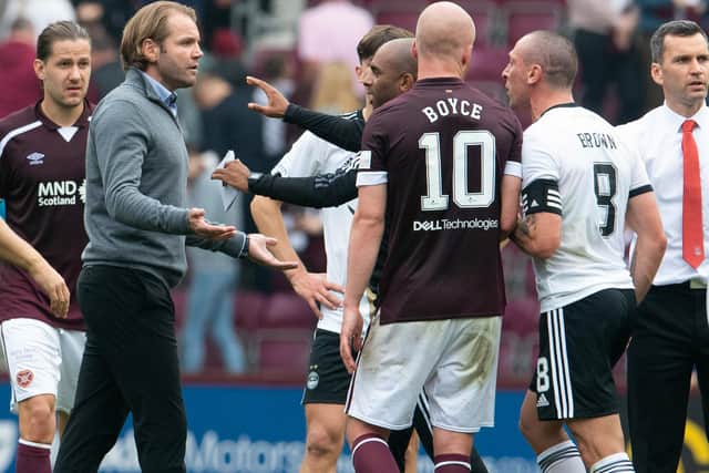 Robbie Neilson and Scott Brown argue at full-time at Tynecastle.