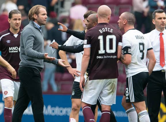 Robbie Neilson and Scott Brown argue at full-time at Tynecastle.