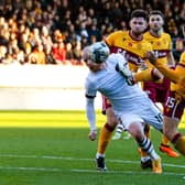Hearts were denied a penalty when Liam Boyce went down under a tackle from Motherwell's Dan Casey. (Photo by Craig Foy / SNS Group)