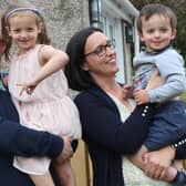 Kenny and Crystal Arnott with three-year-old Benjamin and his big sister, Lily, five in their garden Penicuik.