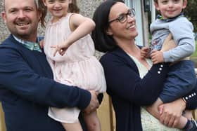 Kenny and Crystal Arnott with three-year-old Benjamin and his big sister, Lily, five in their garden Penicuik.