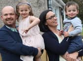 Kenny and Crystal Arnott with three-year-old Benjamin and his big sister, Lily, five in their garden Penicuik.