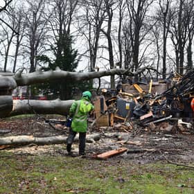 Workers survey Storm Isha damage to an electrical substation in Falkirk. Image: Michael Gillen