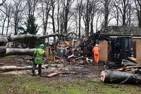 Workers survey Storm Isha damage to an electrical substation in Falkirk. Image: Michael Gillen