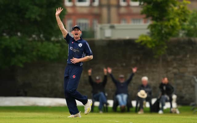 Scotland celebrate qualifying for the T20 World Cup.