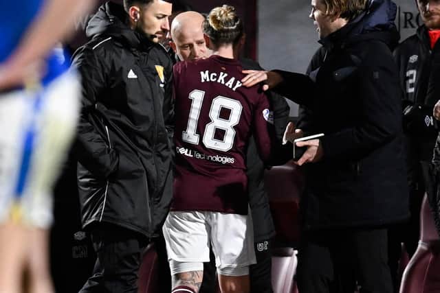 Hearts' Barrie McKay (centre) is congratulated by manager Robbie Neilson on an excellent display.