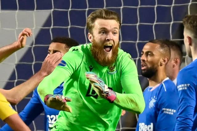 Zander Clark celebrates after helping St Johnstone equalise in the final minute of extra-time against Rangers at Ibrox. (Photo by Rob Casey / SNS Group)