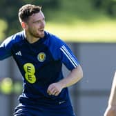 Andy Robertson has a smile on face from joining up with the Scotland camp.
