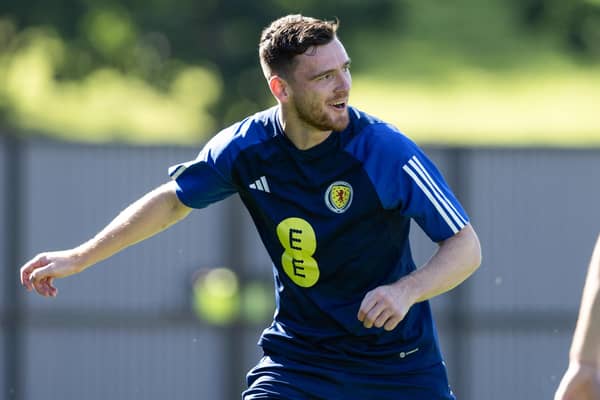 Andy Robertson has a smile on face from joining up with the Scotland camp.