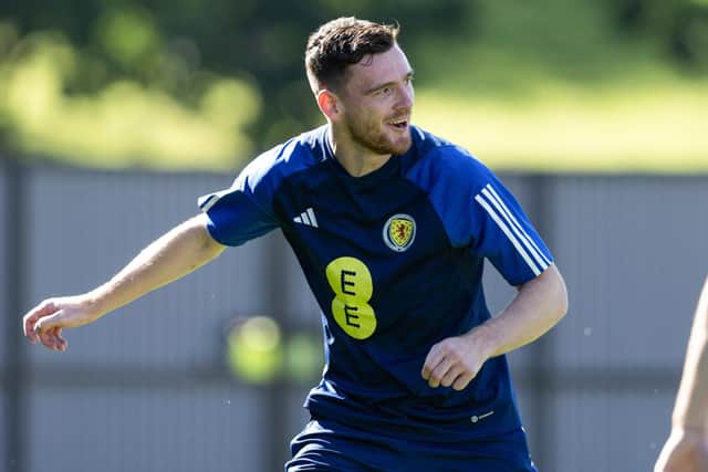 Andy Robertson has a smile on face from joining up with the Scotland camp.