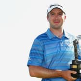 Martin Laird holds the trophy after winning the 2013 Valero Texas Open at TPC San Antonio. Picture: Michael Cohen/Getty Images.