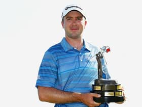 Martin Laird holds the trophy after winning the 2013 Valero Texas Open at TPC San Antonio. Picture: Michael Cohen/Getty Images.