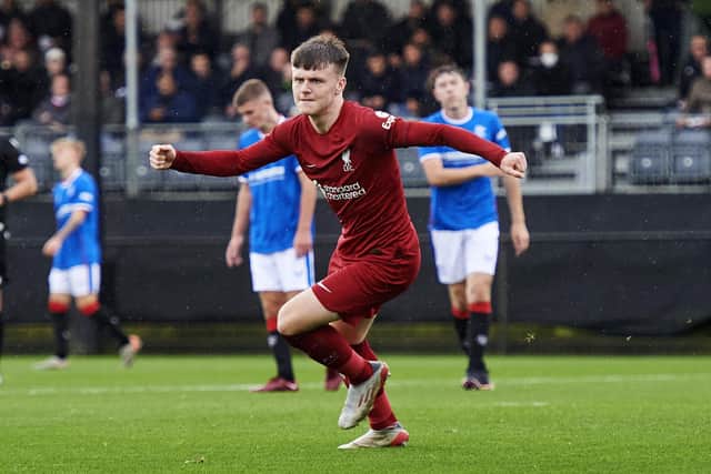 Ben Doak of Liverpool celebrates scoring the second goal at AXA Training Centre against Rangers.