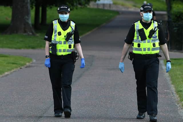 Police arrested and charged a man over an alleged theft in Cardonald Cemetery, Glasgow. Picture: John Devlin.