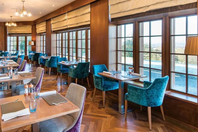 The dining room at Murrayshall, whose Eolas restaurant has won two AA rosettes and a best boutique hotel restaurant award this year, has views looking out over unbroken countryside. Pic: Contributed