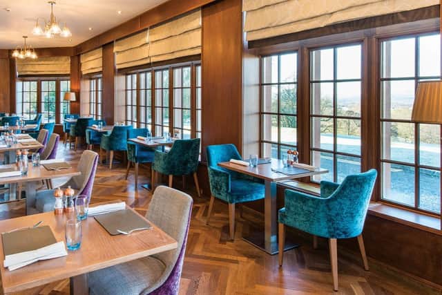 The dining room at Murrayshall, whose Eolas restaurant has won two AA rosettes and a best boutique hotel restaurant award this year, has views looking out over unbroken countryside. Pic: Contributed