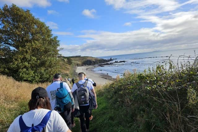 The team completed a 23-mile charity walk from Elie to St Andrews